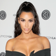Illustration for article titled In Which Kim Kardashian Is Hoisted into a Car